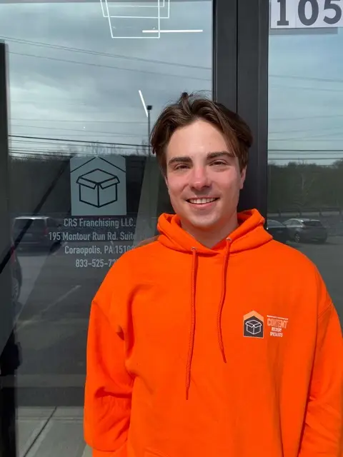 CRS Packout Employee helping Content Recovery Specialists restore lives and memories.