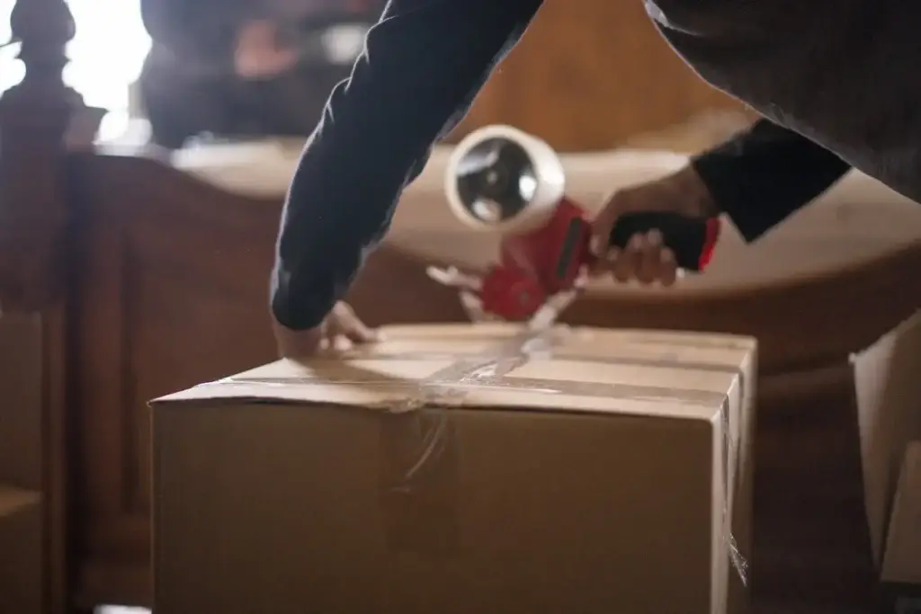 Employees for Content Recovery Specialists (CRS) packing boxes as your trusted packout partner