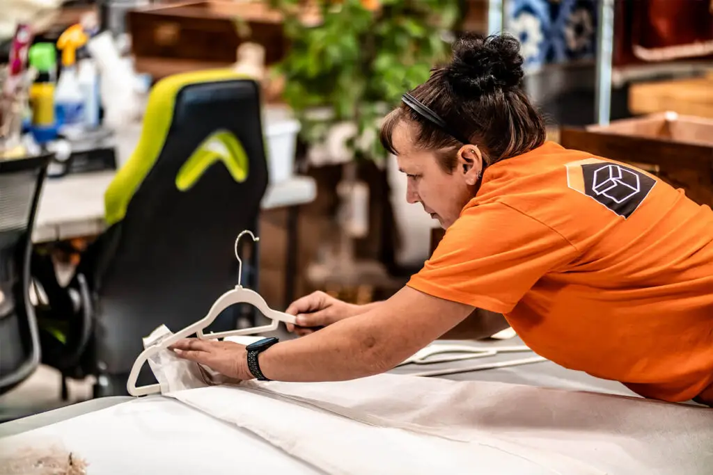 CRS employee in a CRS orange shirt