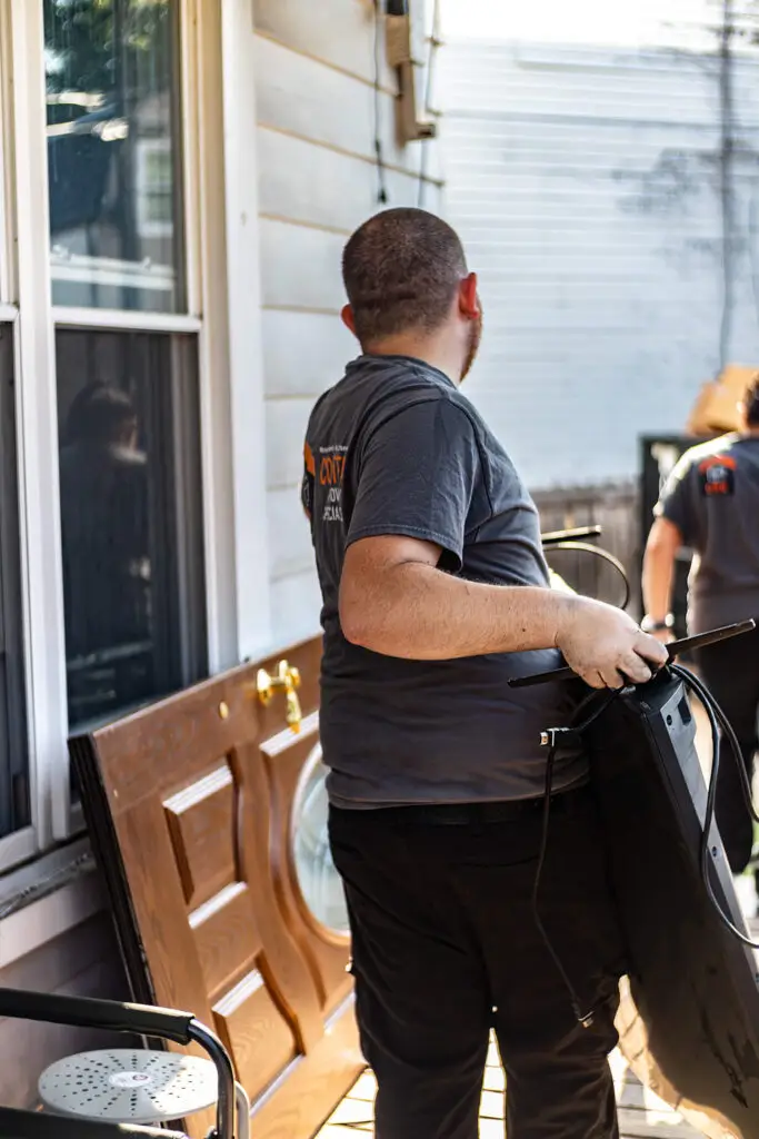 CRS employee handling contents with care