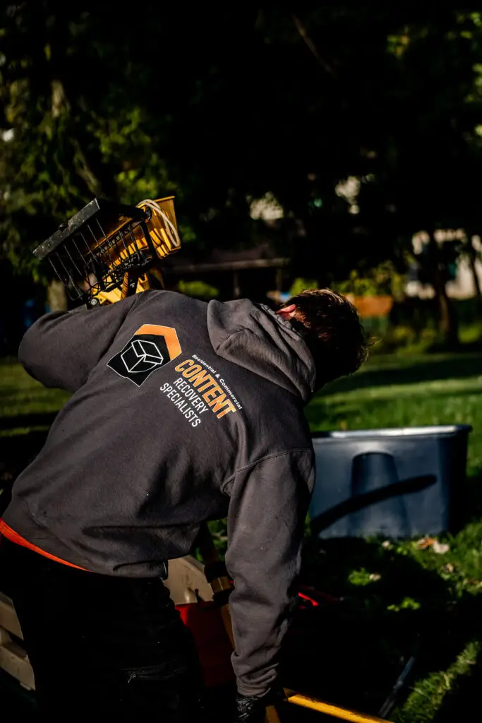 A man restoring and accessing contents for CRS