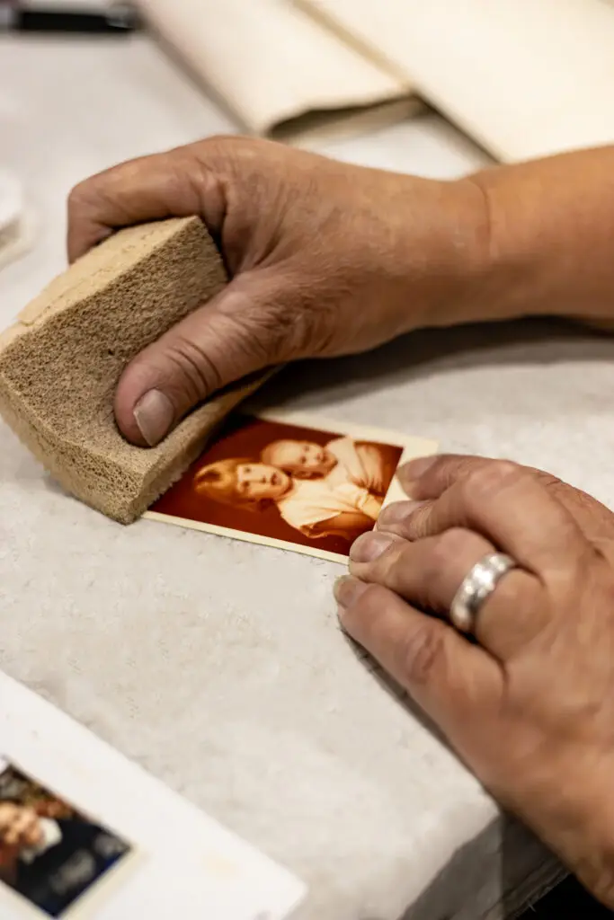 CRS using a dry sponge on a photograph