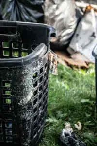 Damaged basket covered in soot