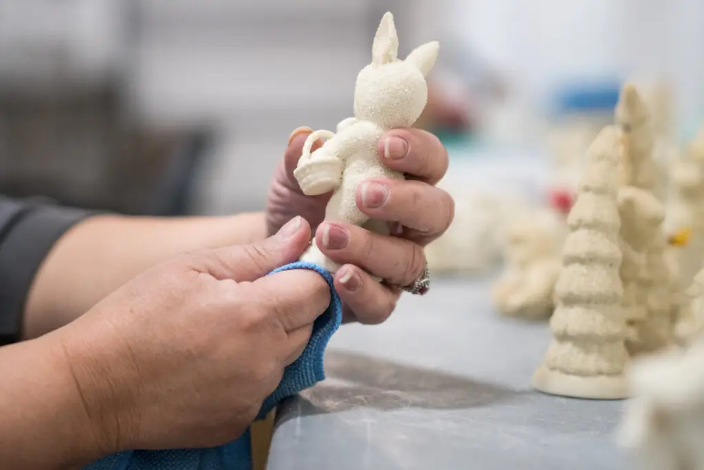 CRS Worker cleaning a sentimental item