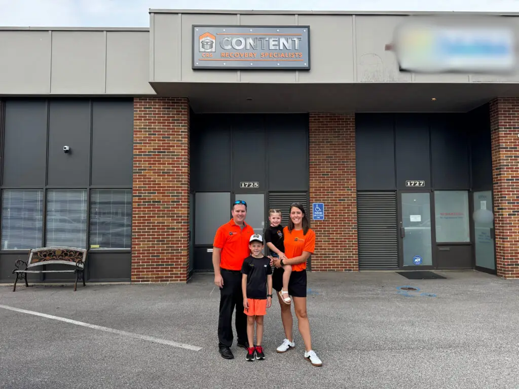 Amanda and Robb Reed standing outside the new CRS Location in St. Louis, MO