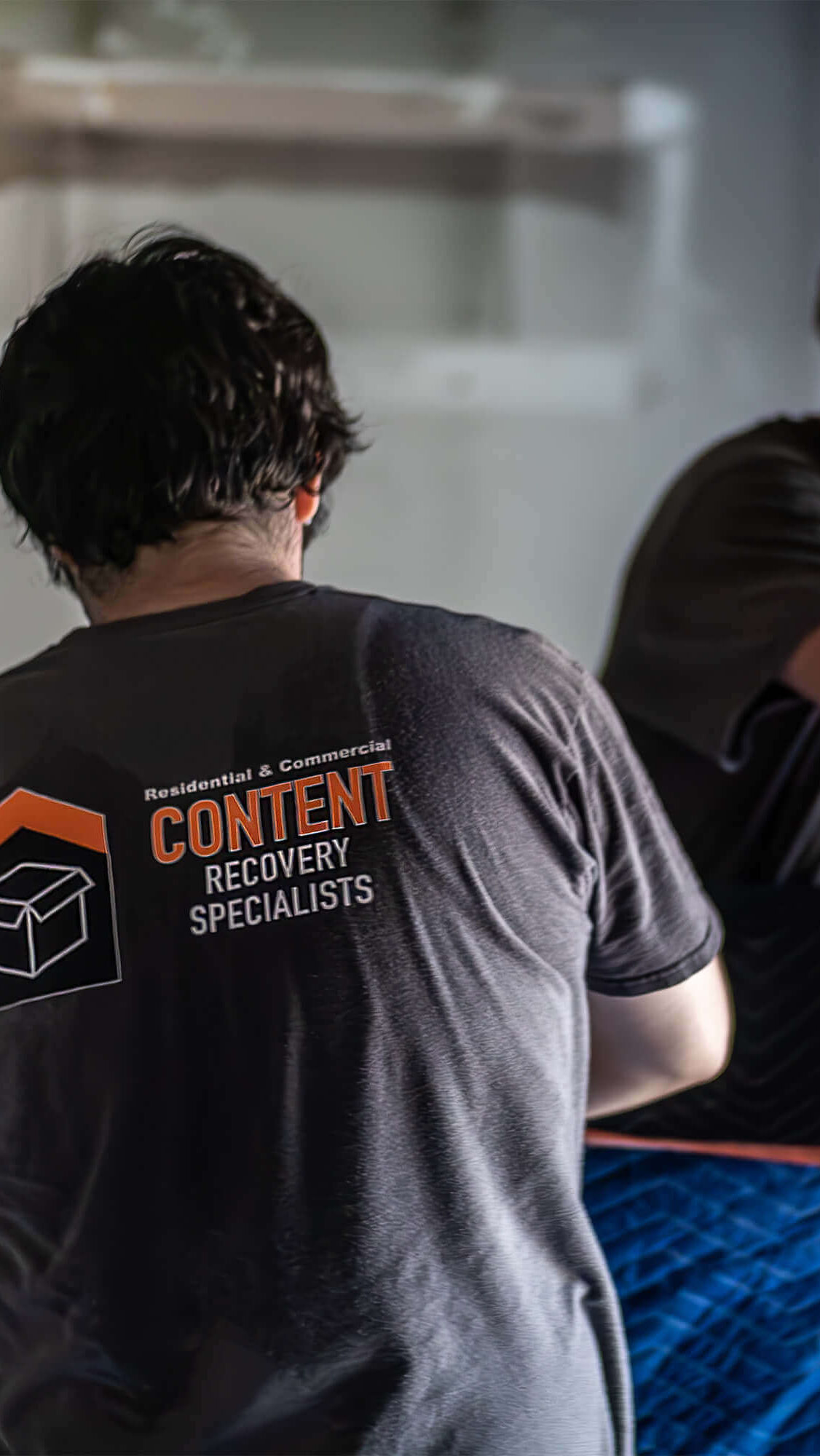 CRS Employees at work together. Expert packout services available through CRS.