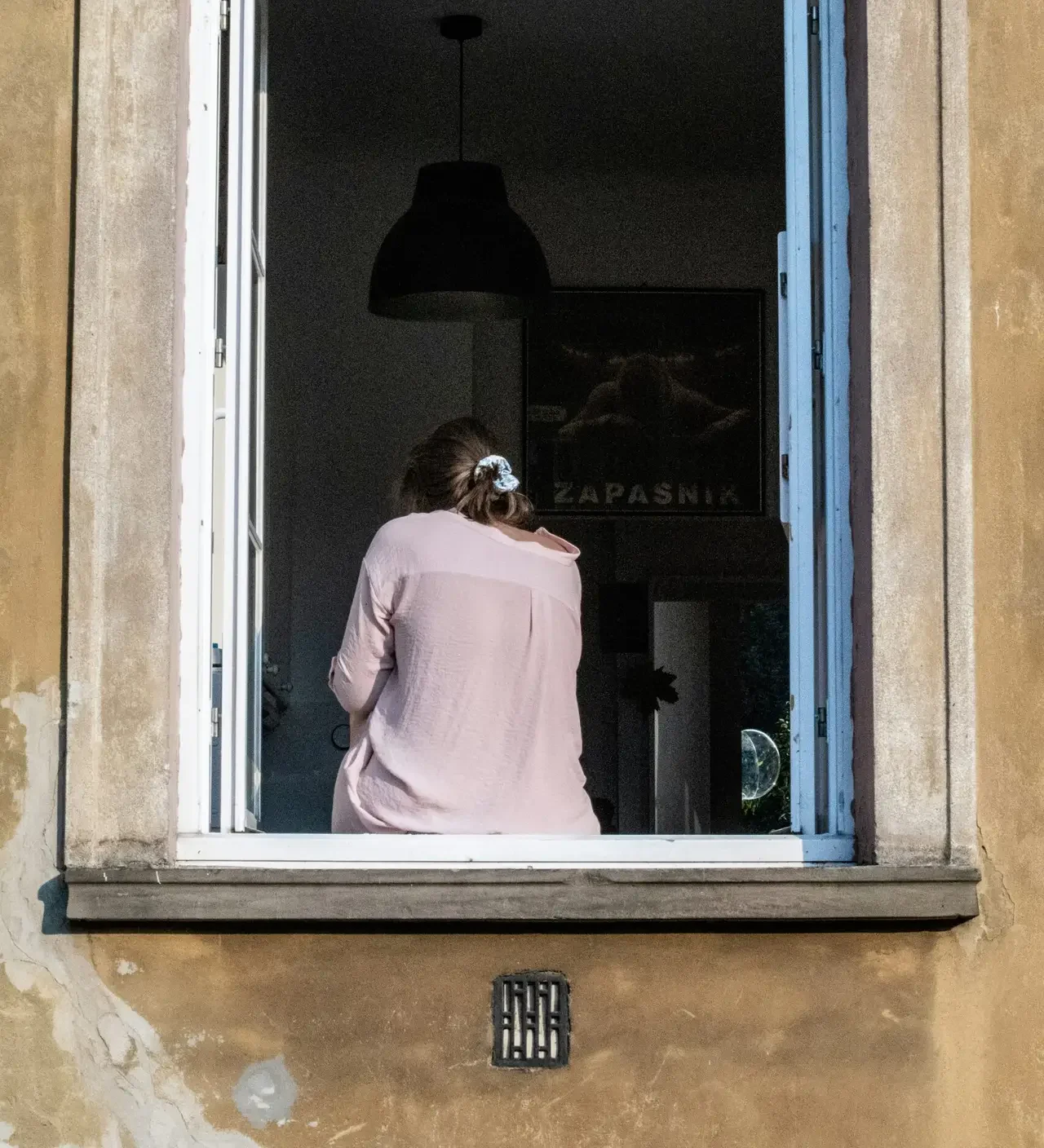 Distressed person on the phone in their house