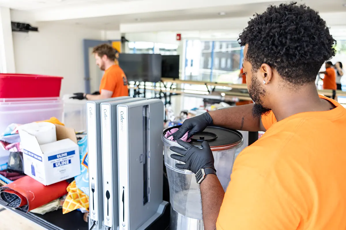 Content Recovery Specialists hand cleaning a dirty item