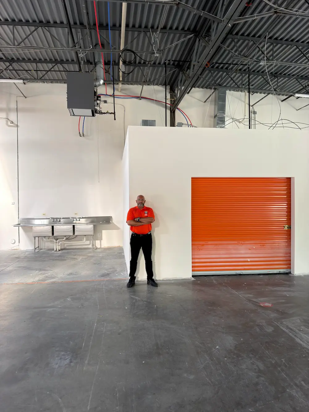 Damon Stinger Content Recovery Specialists of Hanover, MD inside his warehouse